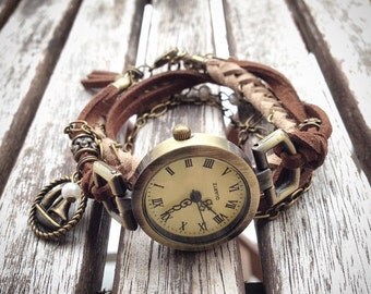 Women's watches boho for wrist, wrap bracelet style, brown and beige suede, charm (boat and feather), white pearls. -MO03-