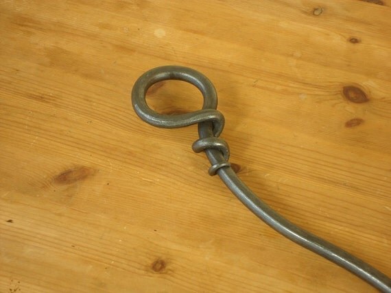 Wrap handled Fire Rake a versatile and elegant handmade fire