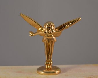 Disney tinkerbell,gold color ,metal,miniature ,collectible