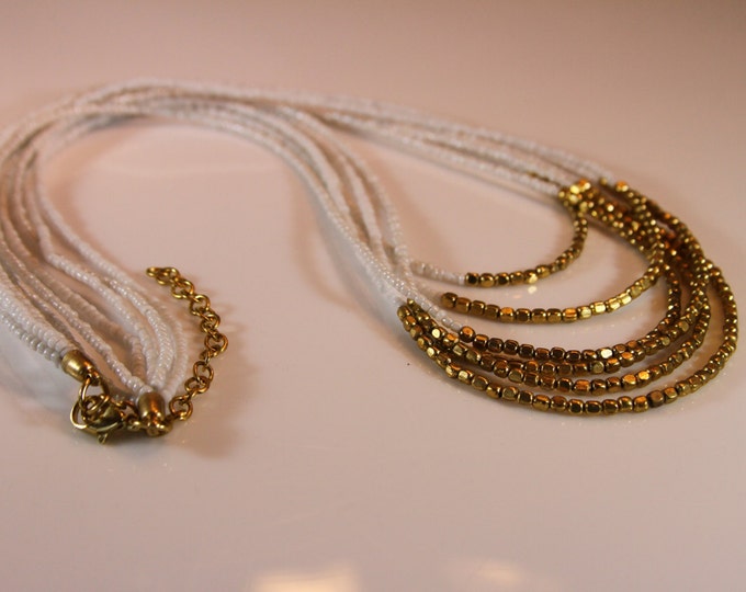 Multi strand white & Gold necklace