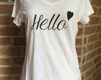 Women's white "Hello" v-neck tee.