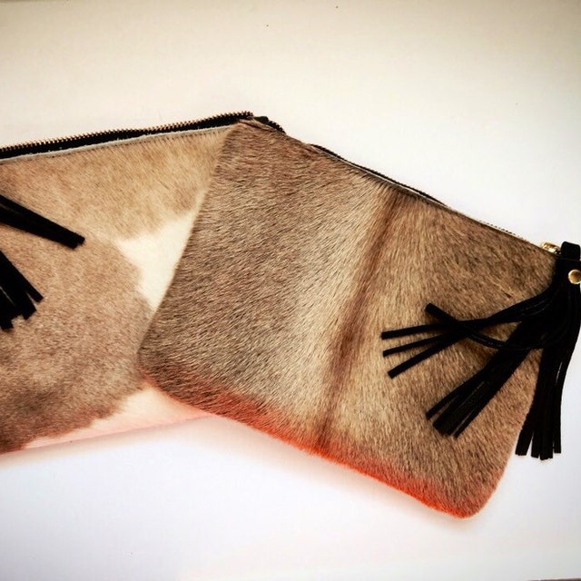 Beautiful cowhide products made with and leather. by SeamReap1