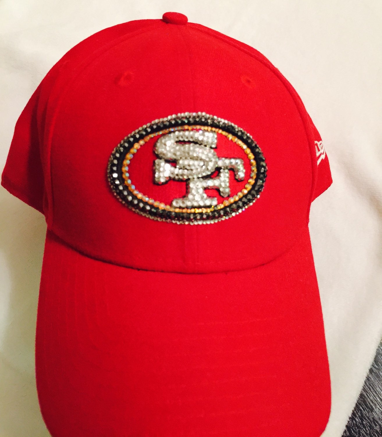 San Francisco 49ers Swarovski Crystal baseball caps. One red