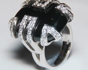 14 k gold with diamond and Black Onyx gem ring