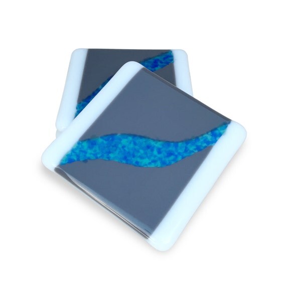 Glass coasters in warm gray bright white true blue and