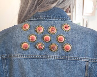 Handmade nipple brooches