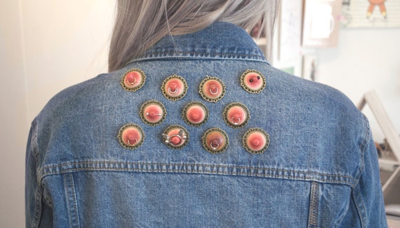 Handmade nipple brooches