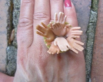 Seven Hand Barbie - upcycled bottle cap ring- b