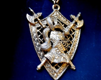 Renaissance vintage 50s gold tone metal necklace with ornate, shield style, filigree pendant and french soldier as a centerpiece.