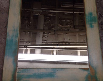 21 x 25-1/4 framed mirror