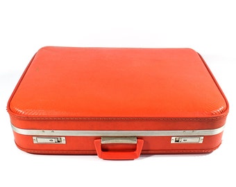 orange hard shell suitcase
