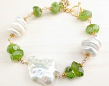 Popular items for rough cut peridot on Etsy