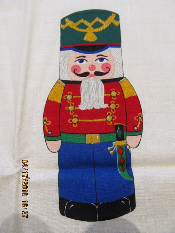 Nutcracker Soldiers fabric panel by Cranston VIP Fabrics.