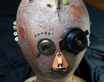 Steampunk Skull, "Lady Anna Maitryx," recycled gears and cuckoo clock parts, metal embellishments; steampunk decor, cosplay accessory