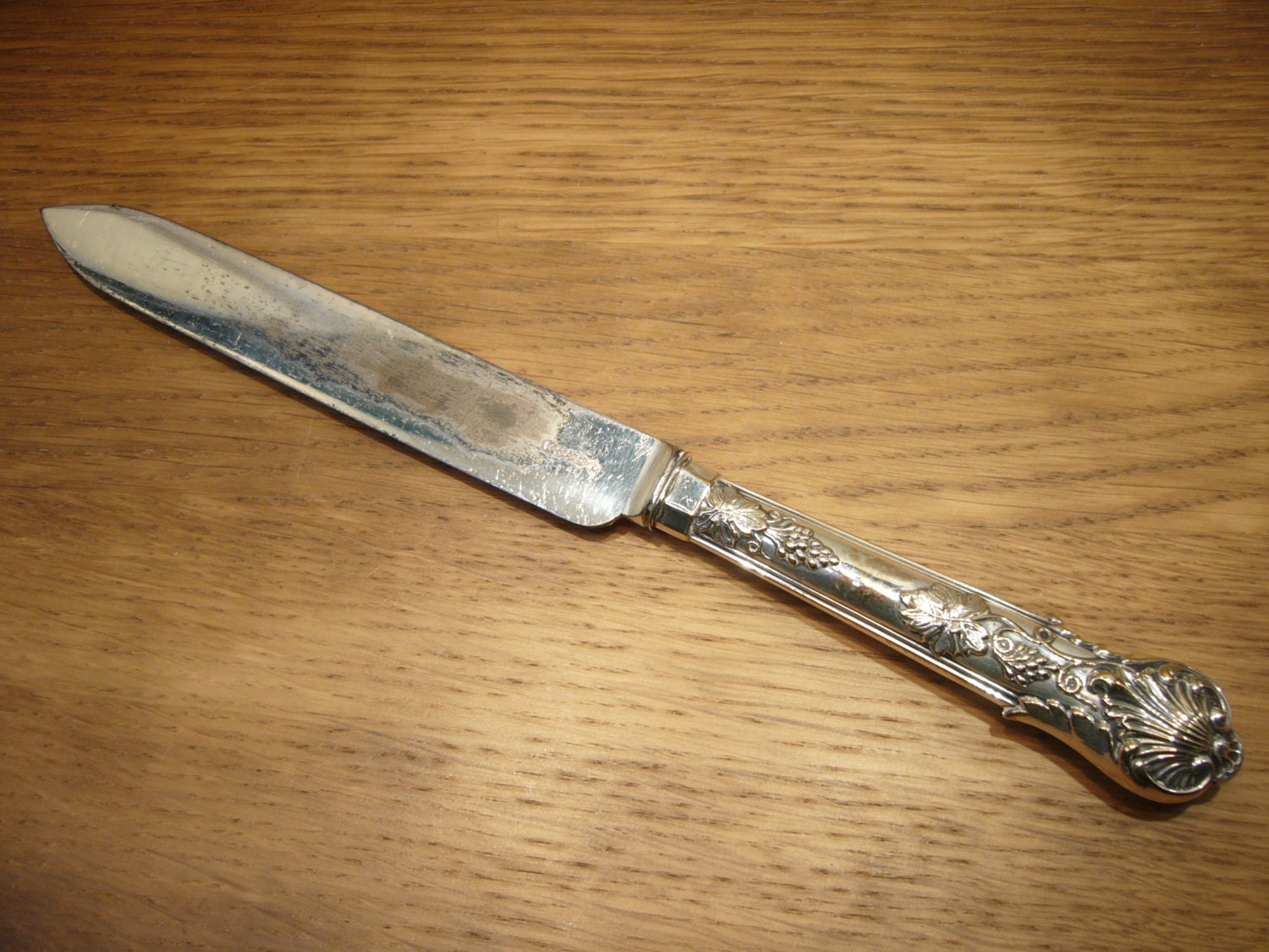 Antique Victorian silver plated cake knife with ornate