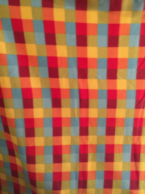 Brightly colored Plaid fleece FABRIC FOR A blanket throw or