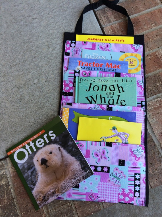 Items similar to Traveling Book Organizer, Over the Headrest Book