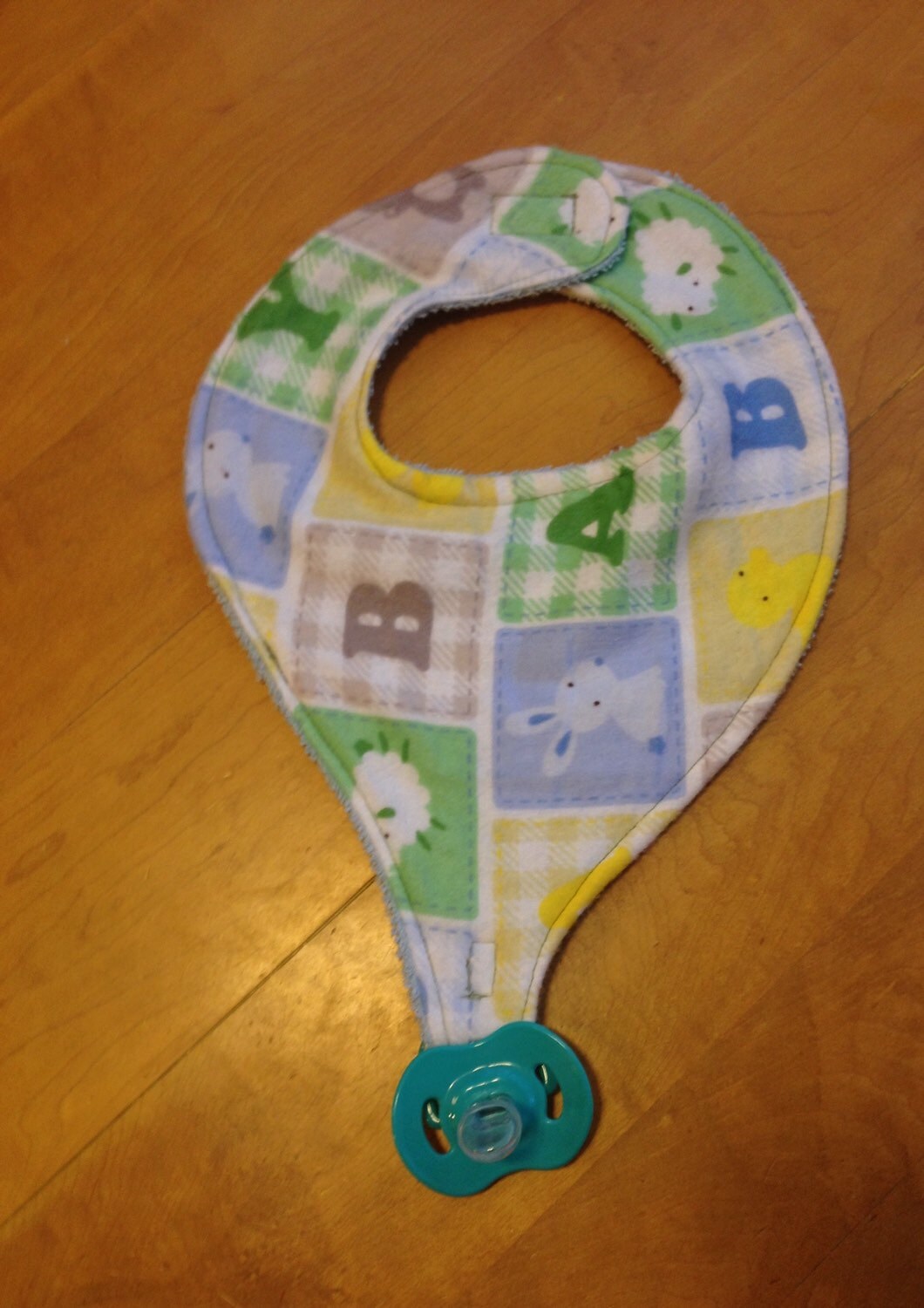 ABCs block binkie bib/ pacifier holder