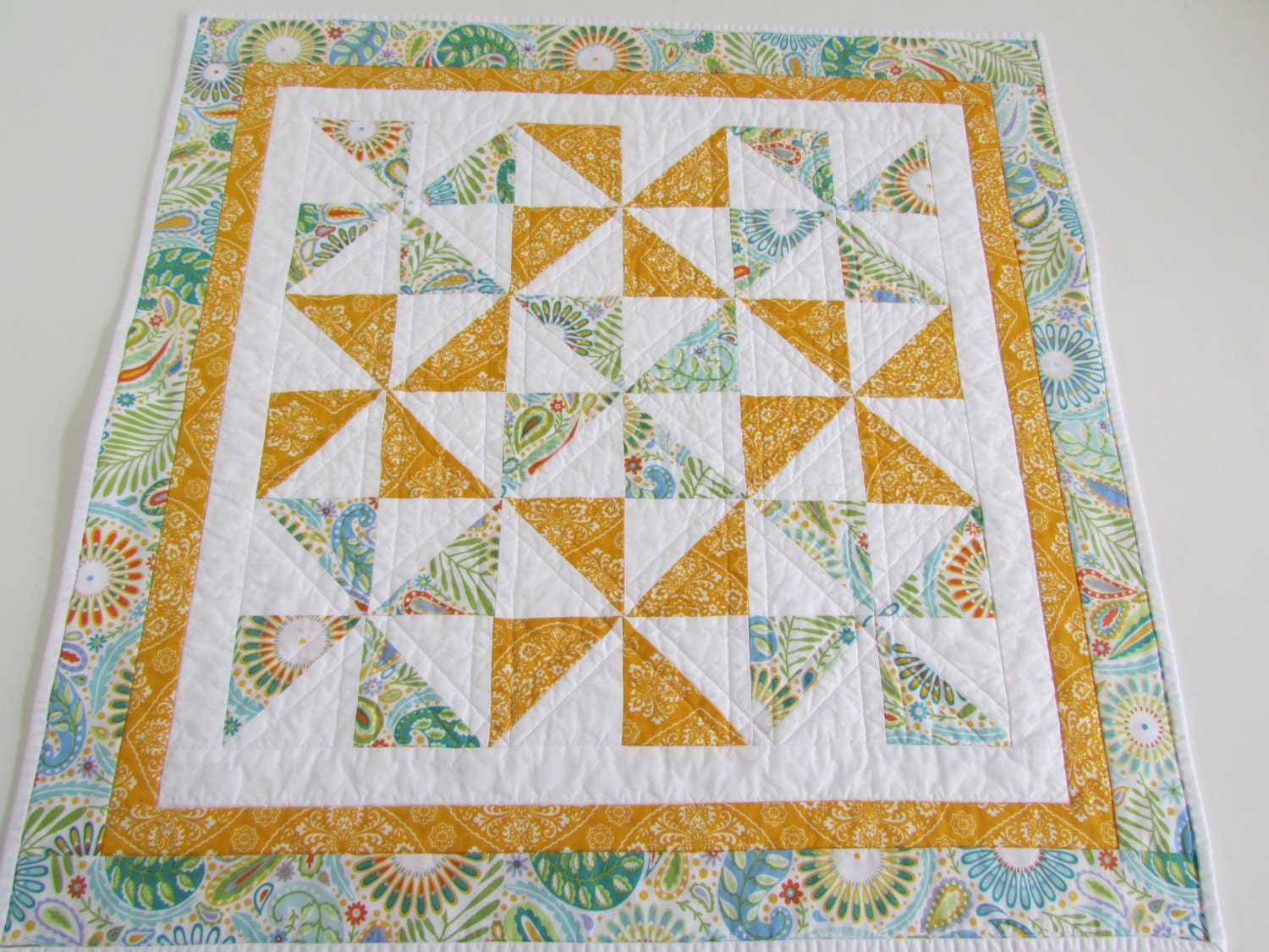 quilted-square-table-topper-blue-and-gold-modern-prints-add