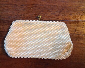 Vintage beaded clutch...........1950s.........goldtone kiss closure......off white color