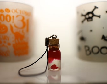 Bloody heart in a bottle cellphone charm (Halloween exclusive)