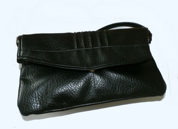 black faux leather clutch bag