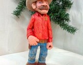 Hand carved wood western cowboy sheriff sculpture with red shirt, jeans boots and cowboy hat by Dan and Debbie Easley