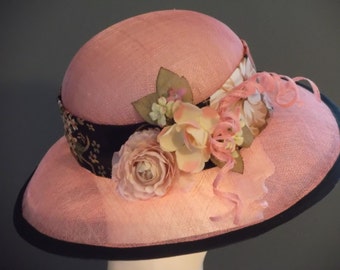 Kentucky Derby hat, pink sinamay wide brim hat, silk band, floral spray, black trim, hand blocked, derby, church, wedding, tea party, lunch