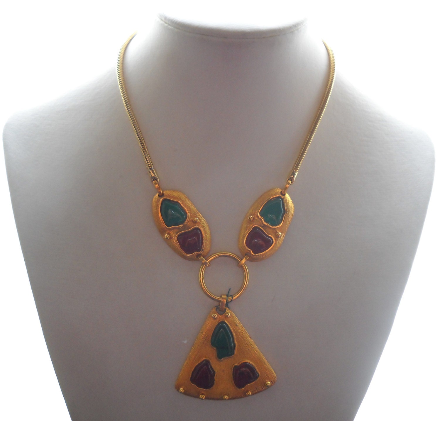 70s necklace in gold plated brass a triangular medallion with