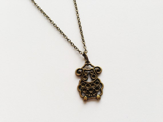 cult of the lamb flower necklace