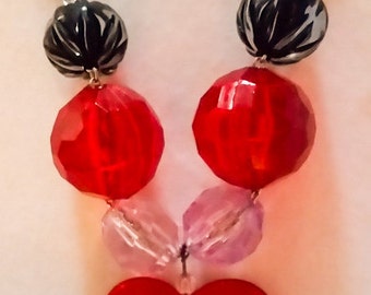 Beautiful red heard necklace. This says love!