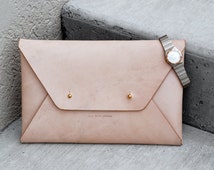 Popular items for leather clutch on Etsy
