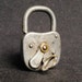 Antinque heavy industrial Plock padlock.