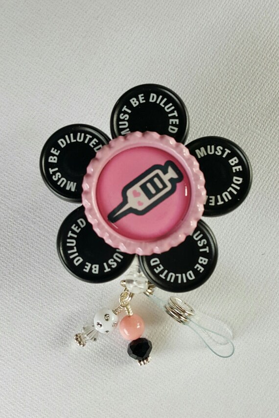 Syringe vial cap retractable badge reel ID holder