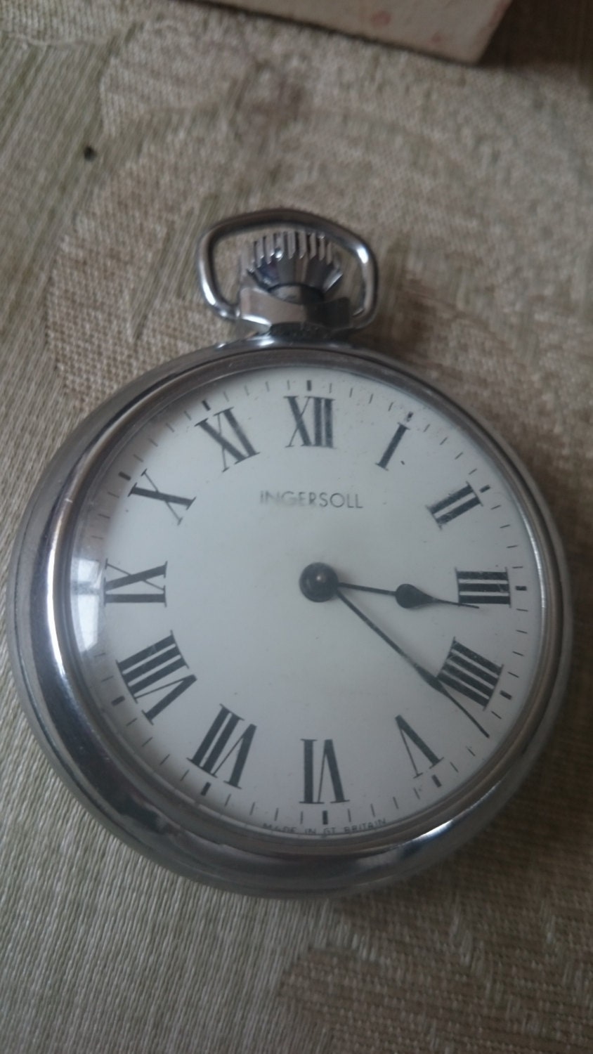 A vintage Ingersoll pocket watch