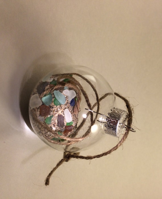 Download Clear glass 60 mm Ornaments filled with Lake Erie sand and