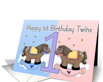Twins First Birthday Card - Two Little rocking horses, pink rocking horse, blue rocking horse, twins first birthday