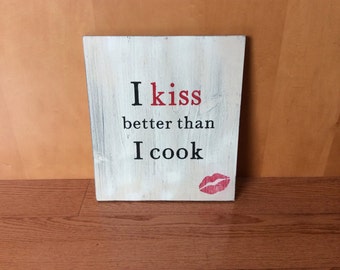 I kiss better than I cook wooden sign