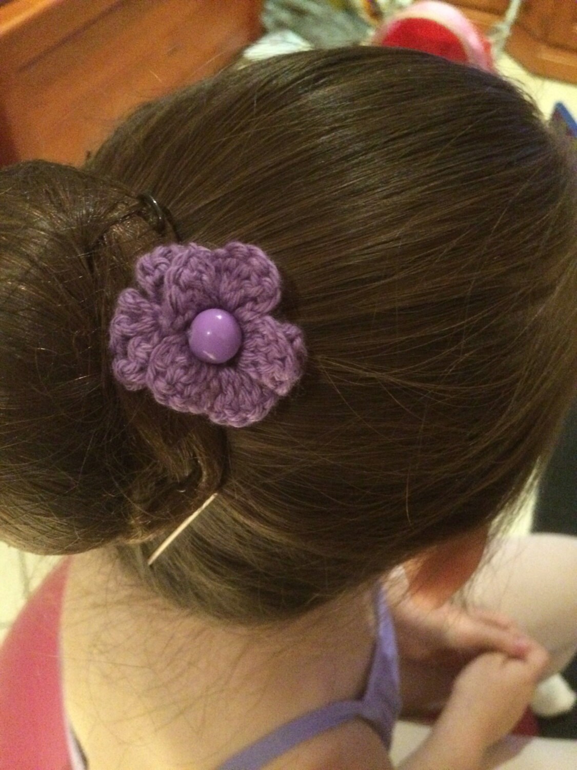 Bun flower hair accessory