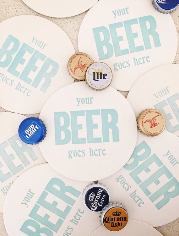 Set of eight 'Your Beer Goes Here' letterpress