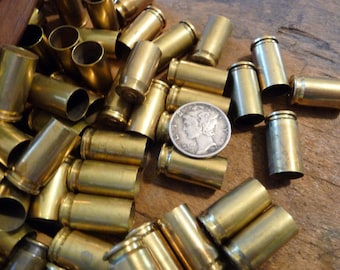 BULLETS - 12 brass shells, bullet casings, spent shells, small bullet shells