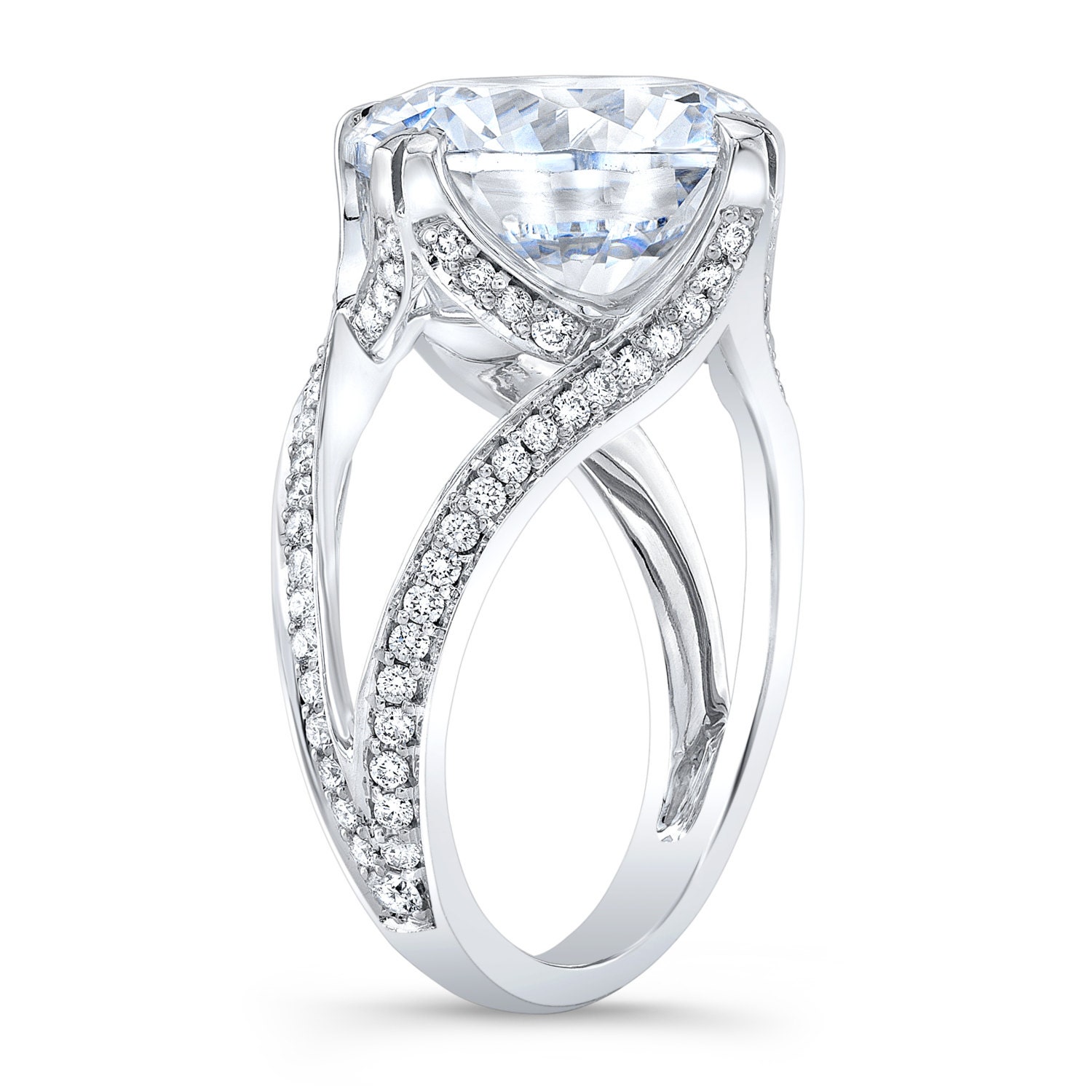 Women's Platinum engagement ring with pave halo Round