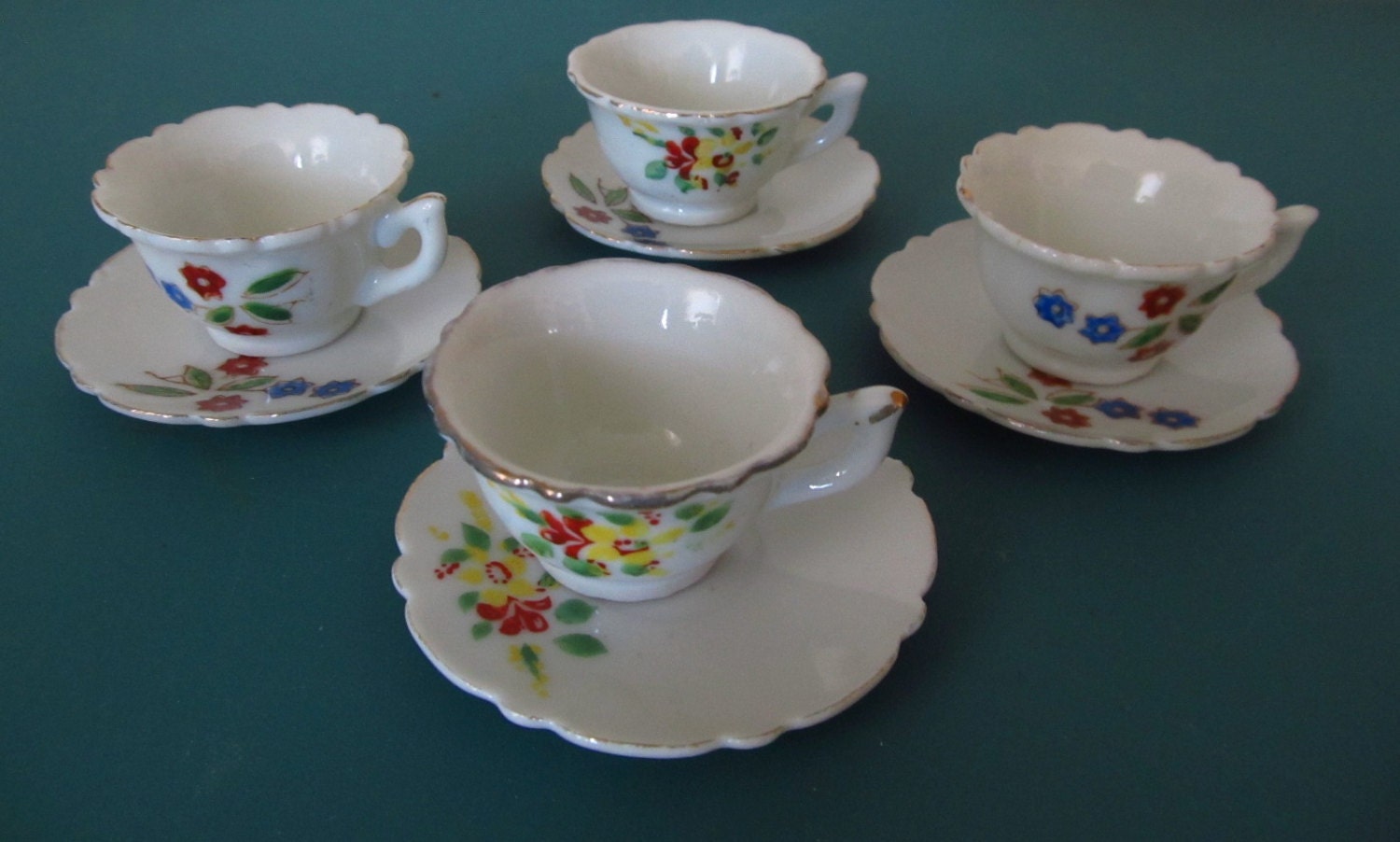 miniature porcelain tea cups and saucers