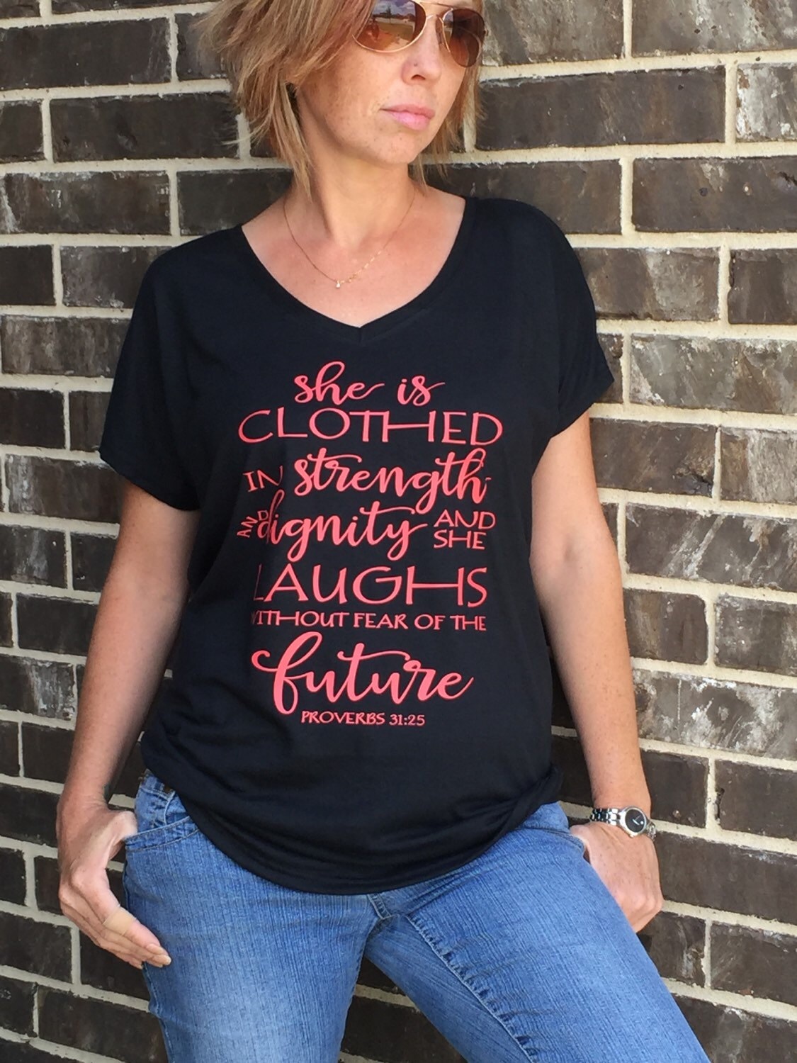 she is clothed in strength and dignity shirt