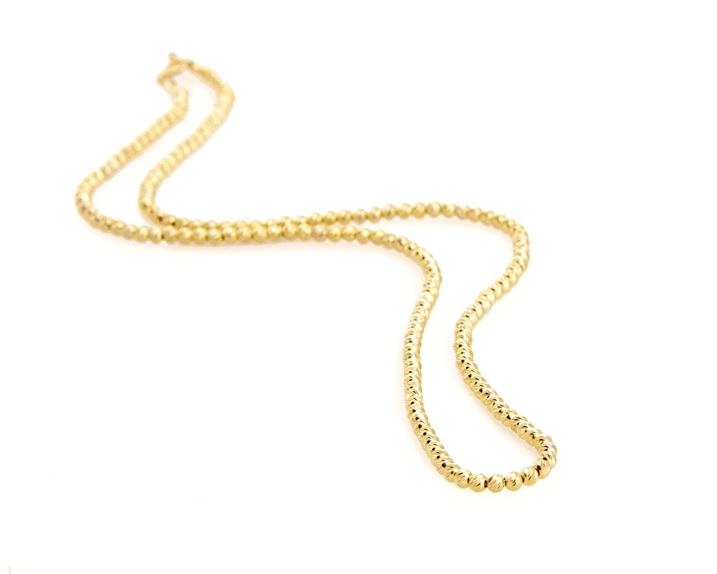 Gold chain necklace made of 14k gold filled tiny balls with a