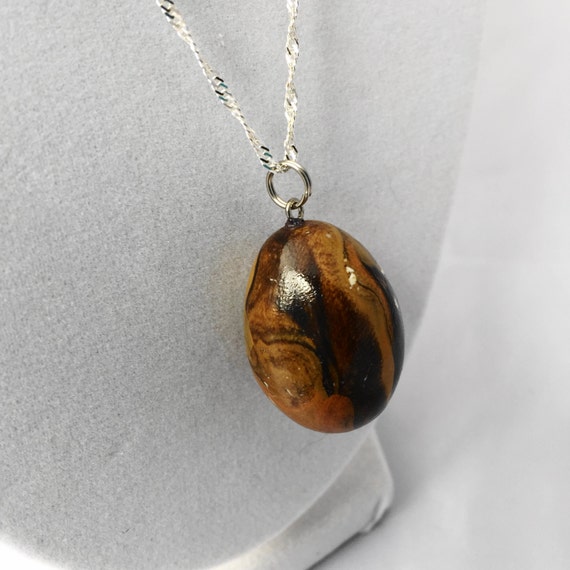 Autumn egg pendant on silver plated chain 18 inch chain