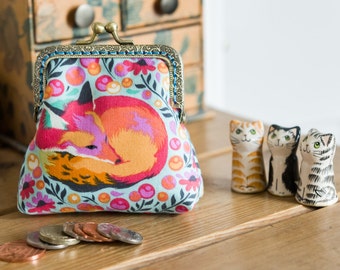 Coin purse made with 'Fox Nap' cotton print by Tula Pink in sorbet colour with a turquoise lining & hand stitched bronze colour metal frame