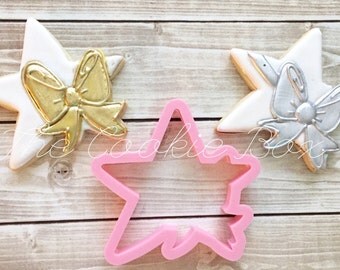 Miss Doughmestic's star with Bow