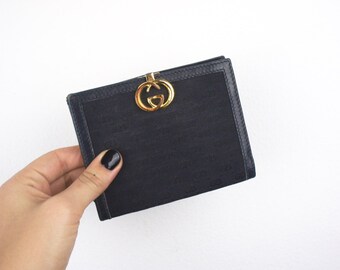 four coach wallets