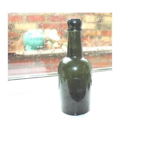 Download Antique dark green glass beer/porter bottle. Antique ale Yellowimages Mockups